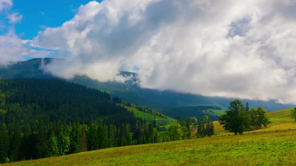 Mountain Landscape with a Fast Clouds and Shadows