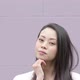 Portrait of flirting Chinese woman, purple background - VideoHive Item for Sale
