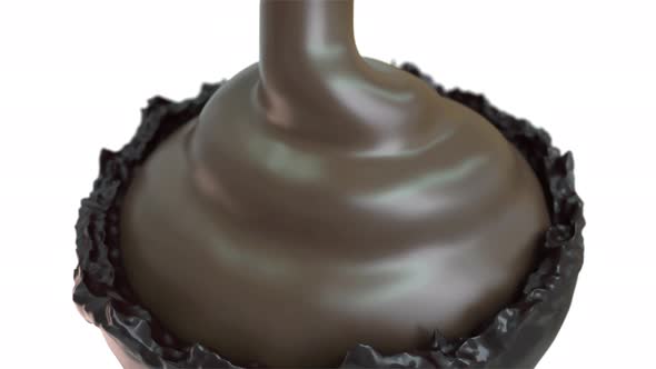 Pouring Melted Chocolate Down On Chocolate Candy