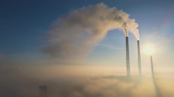 Aerial View of Coal Power Plant High Pipes with Black Smoke Moving Up Polluting Atmosphere at