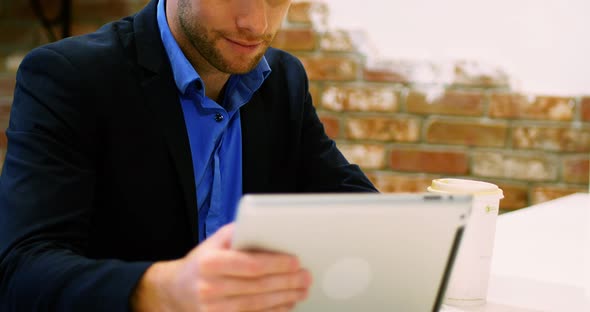 Businessman using digital tablet