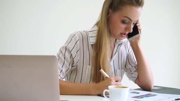 Blonde Business Woman Working at Modern Office