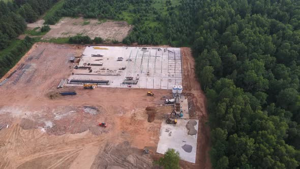 Flight Over the Construction of a Warehouse of Metal Structures