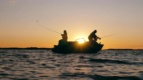 Sunset Lake and a Father Fishing with Kids