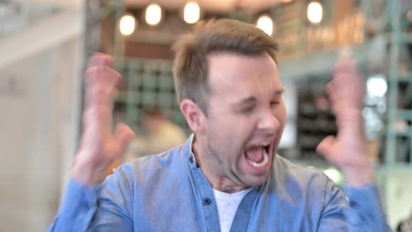 Portrait of Angry Casual Man Shouting, Screaming