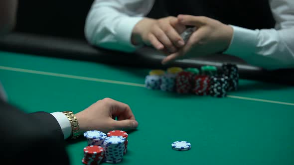 Businessman Playing Poker at Casino, Getting Cards, Chance to Win Big Money