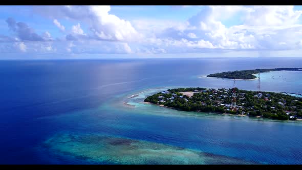 Aerial flying over nature of tranquil sea view beach journey by clear lagoon with clean sandy backgr