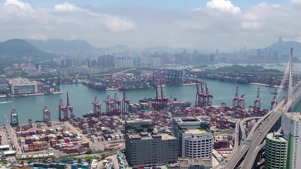 Timelapse Hong Kong Cargo Container Terminal with Red Cranes