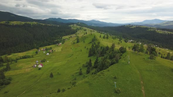 Drone flight over the Ukrainian Carpathians in summer. Fascinating landscapes in the mountains. Immo