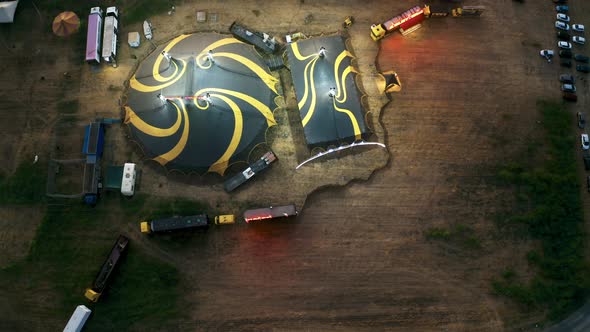 Big Top of a Circus with Caravans in a Field