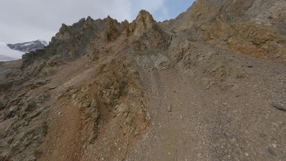 Aerial View Flying Over Organic Mountain Summit Cracked Texture Stone Pebble Cliff Geology Formation