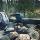 Backpack and Metal kettle on a campfire in the forest - VideoHive Item for Sale