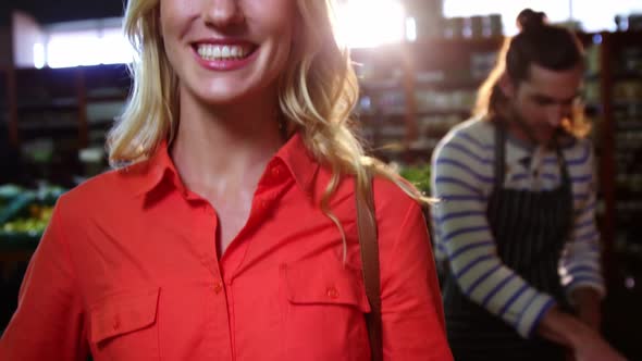 Portrait of smiling woman in organic section