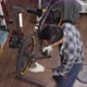 Top view of Asian senior man owner repairing and checking wheels and gears of bicycle - VideoHive Item for Sale