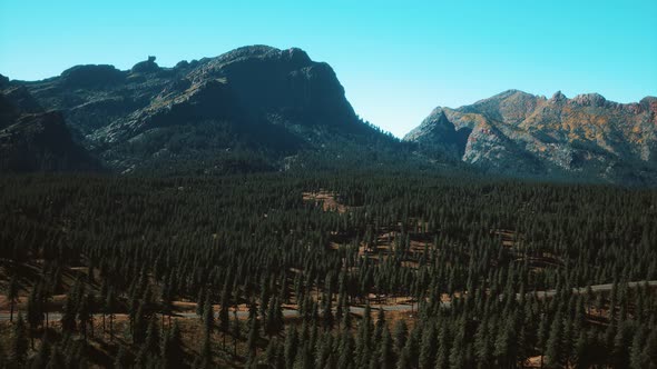 Aerial View of Mountain Road and Forest