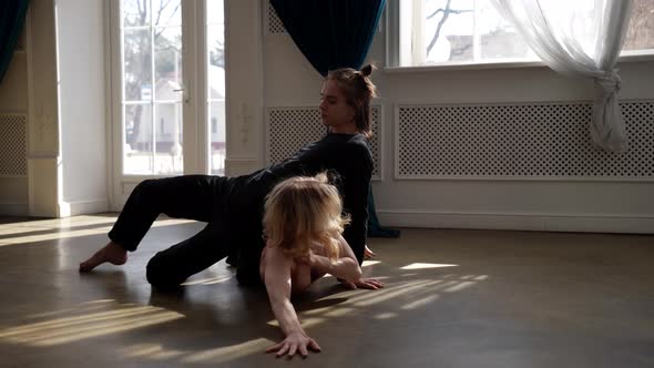 Couple of Young Dancers are Rehearsing Dance in Hall Contemporary Choreography Slow Motion Shot