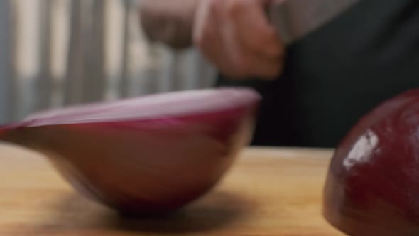 Professional Chef Cuts Red Onion