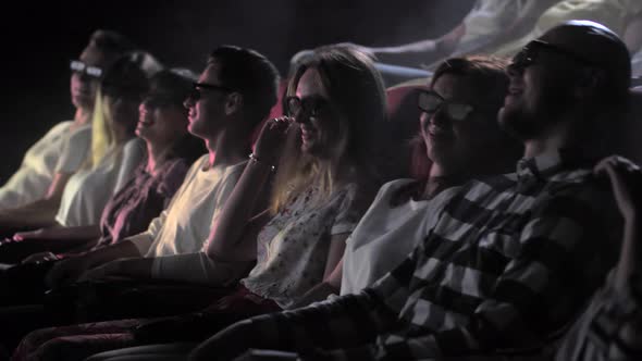 Excited People in 3d Glasses Watching Movie in 4Dx