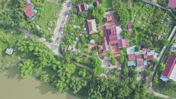 Aerial View Temple Complex Among Park Near River in Vietnam