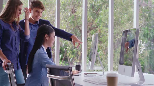 Businesswoman and Businessman Having Conversation in Modern Office