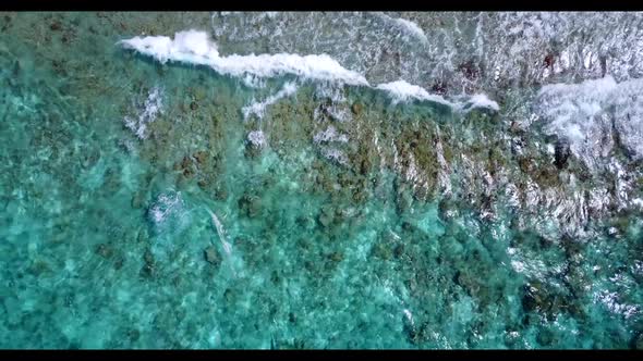 Aerial landscape of exotic shore beach adventure by clear sea and white sandy background of a dayout