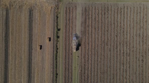 Aerial View of Tractor Making Bales of Hay