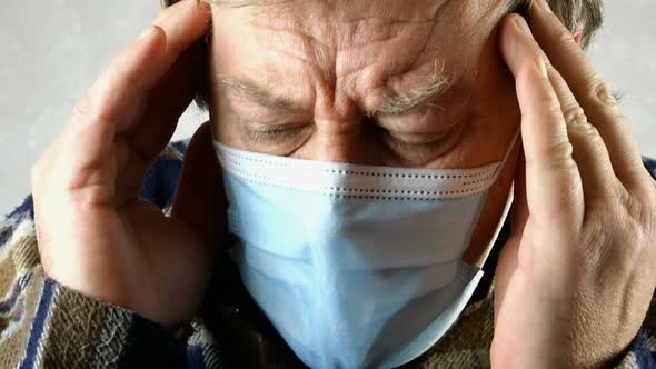 Sick Man in Medical Mask Is Suffocating, Breathing Heavily, He Does Not Have Enough Oxygen