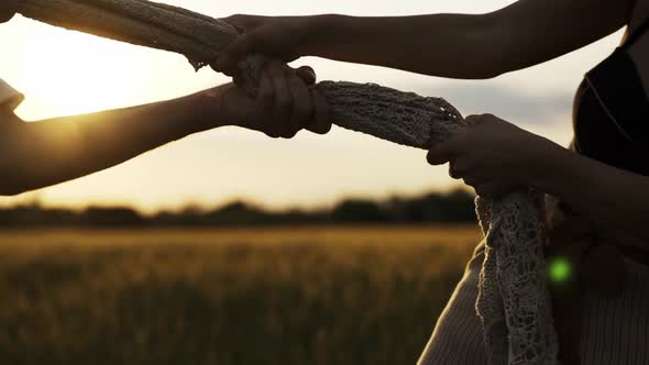 Slow motion shot of couple dancing outdoors in the evening