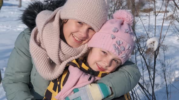 Two Friends on the Snowy Ground