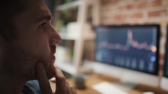 Adult man analyzing stock market data. Shot with RED helium camera in 8K