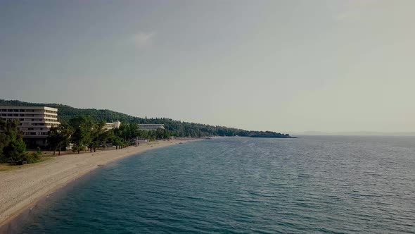 Backwashing aerial drone clip over an exotic beach in Halkidiki, Greece