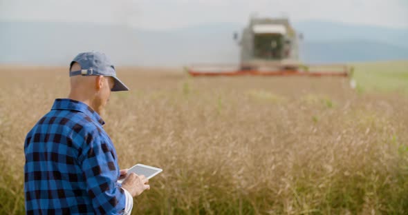 Farmer Using Digital Tablet Agriculture