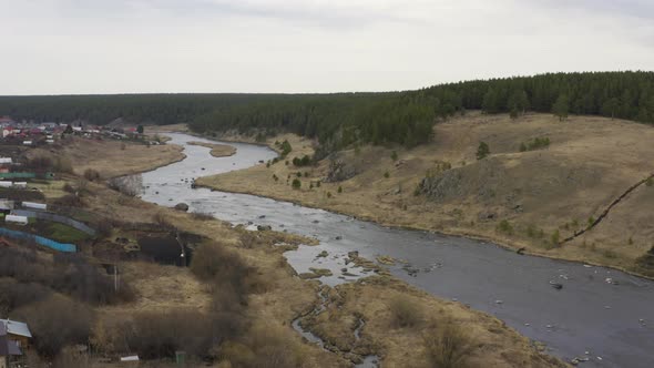 Aerial View of the River with Large Rocks in the Riverbed.