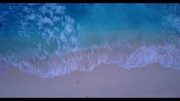Aerial drone scenery of exotic lagoon beach break by transparent ocean with white sand background of