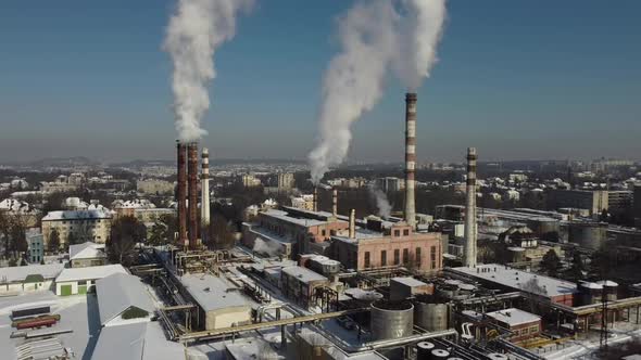 Aerial view of a drone flying over an industrial plant