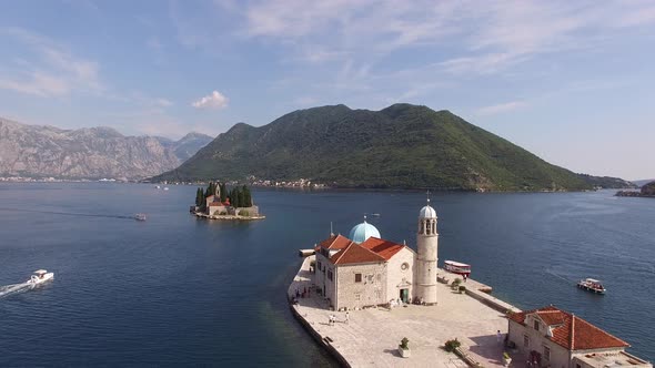 Tourist Boats Sail Past the Island of Gospa Od Skrpjela