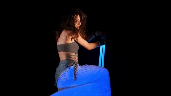 Beautiful Gipsy Woman Dancing In Neon Light With Ultraviolet Staffs 10