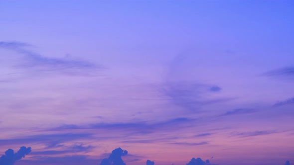4K Sky Time lapse of Colorful clouds during the moving sun alt