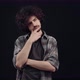 The Thoughtful Curly Boy with His Hand on His Chin Looks Up an Idea Comes to Him but He Quickly - VideoHive Item for Sale