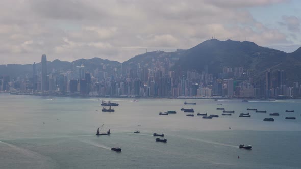 Hong Kong Urban Cityscape Aerial Skyline Panorama Timelapse at Day Pan Up