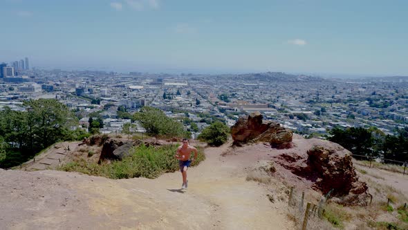 Asian Man Trail Running In San Francisco