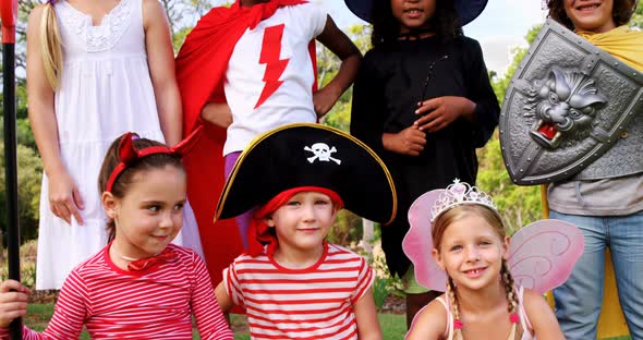 Group of kids in various costumes alt