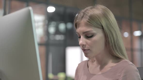 Portrait Shoot of Attractive Woman Working on Computer