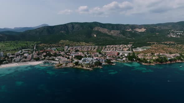 Aerial Drone Top Down Video of Small Emerald Sea Tropical Port