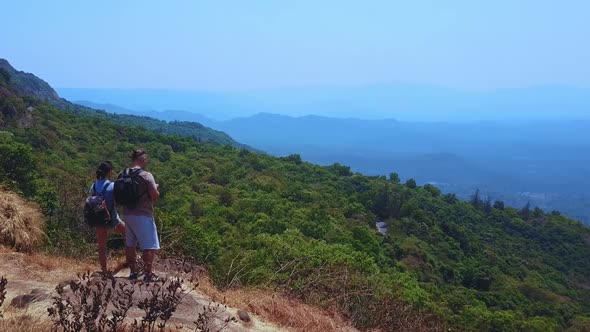 Aerial Turist Romantic Passionate Couple Standing in Love Embrace on Top Enjoying Scenic Beautiful