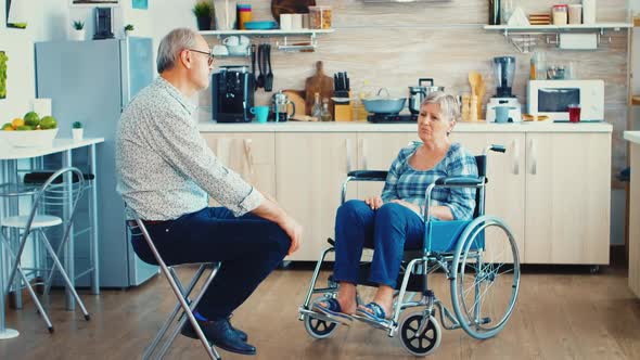 Disabled Woman Sitting in Wheelchair