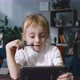 Curious Cute Preschool Kid Girl Using Digital Tablet Technology Device. - VideoHive Item for Sale
