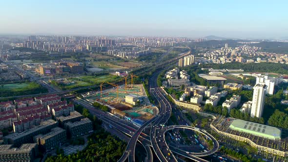 Aerial view of highway and overpass in city