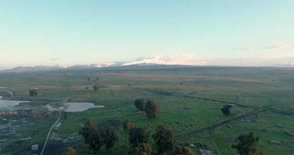 Aerial view of a misty landscape at sunrise, Golan Heights, Israel.