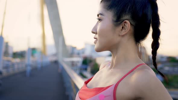 Young Female Athlete in City